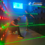 MetaNexusXR laser maze game kit creating complex, smoke-filled laser beams for an immersive room experience. | MetaNexusXR