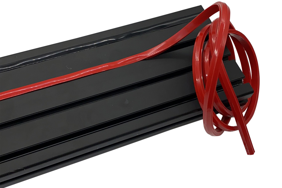Red Rubber Slot Cover Strip for Aluminium Profile Sim Rigs – 2 m Anti-Slip, Anti-Rattle Trim – red rubber slot cover strip pressed into an aluminium profile – photo 2 of 5